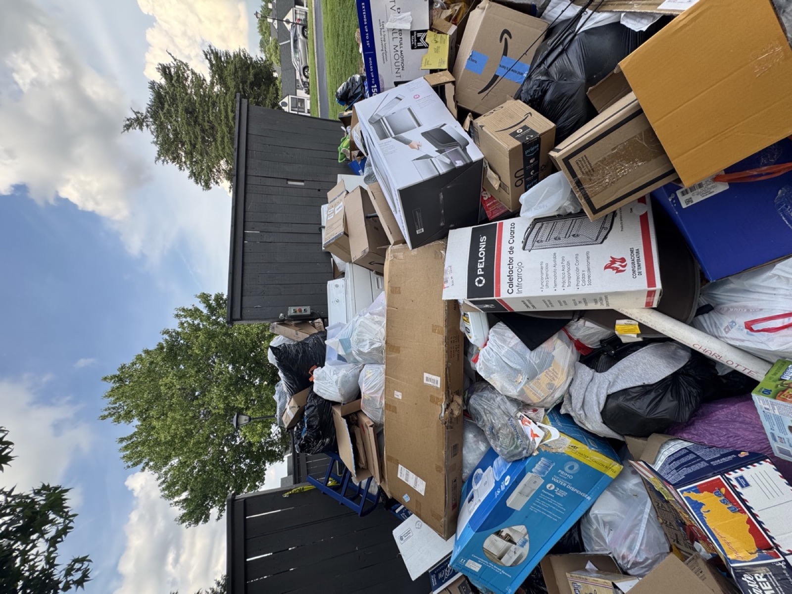 Full property cleanout with boxes and debris removal in the Triad NC