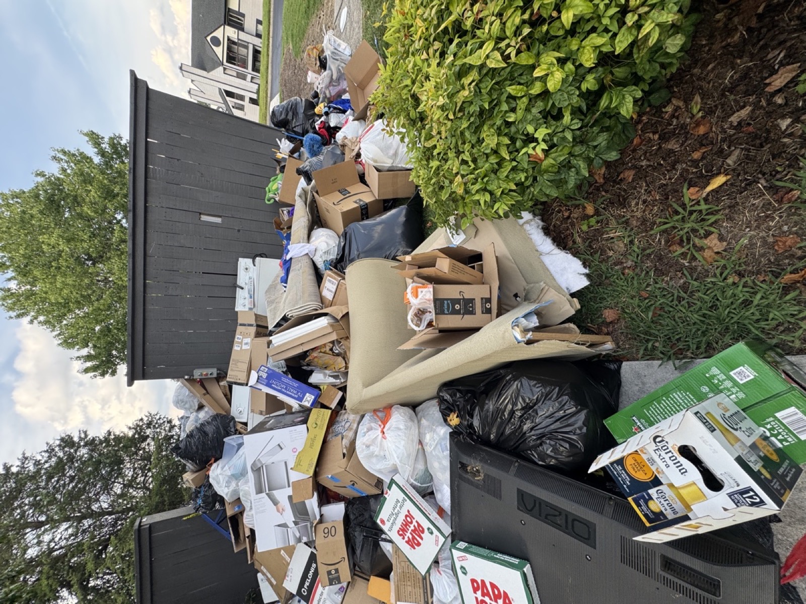 Trash out service removing debris from a property in Greensboro NC
