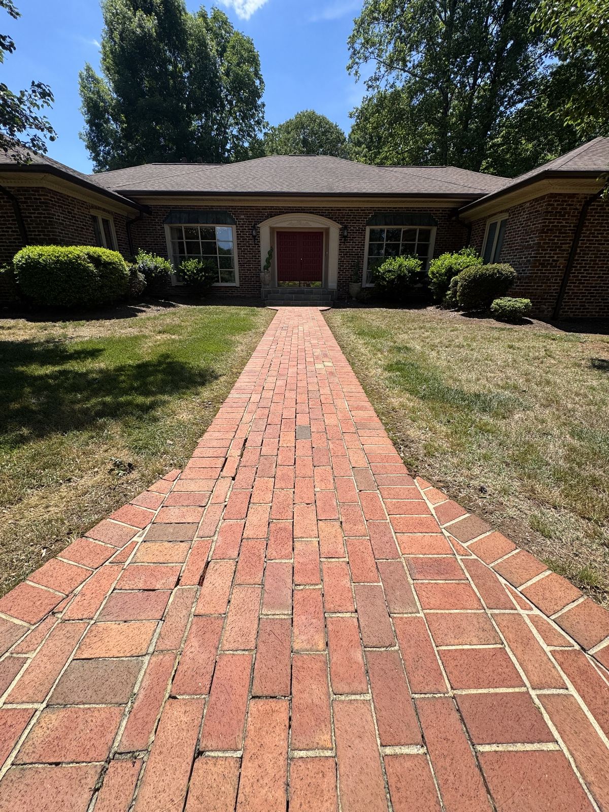 Clean brick walkway after exterior cleaning