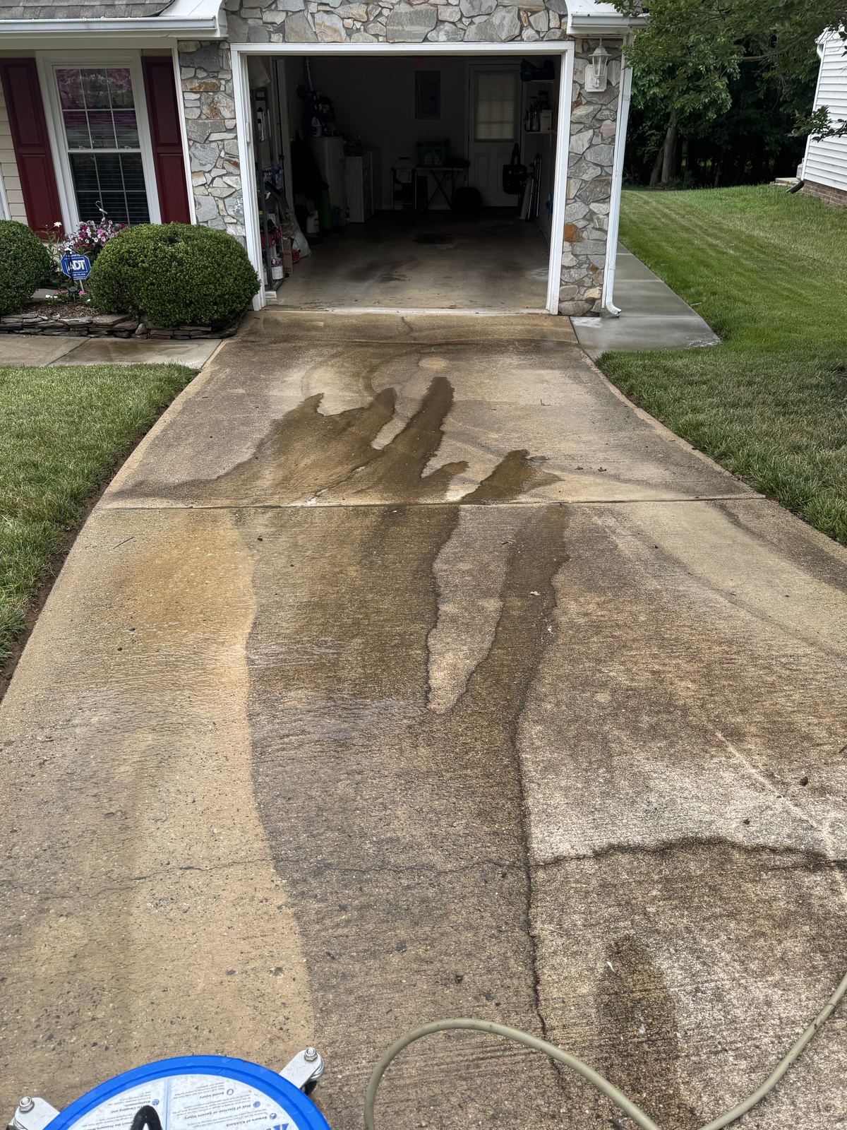 Dirty driveway before pressure washing in Greensboro NC