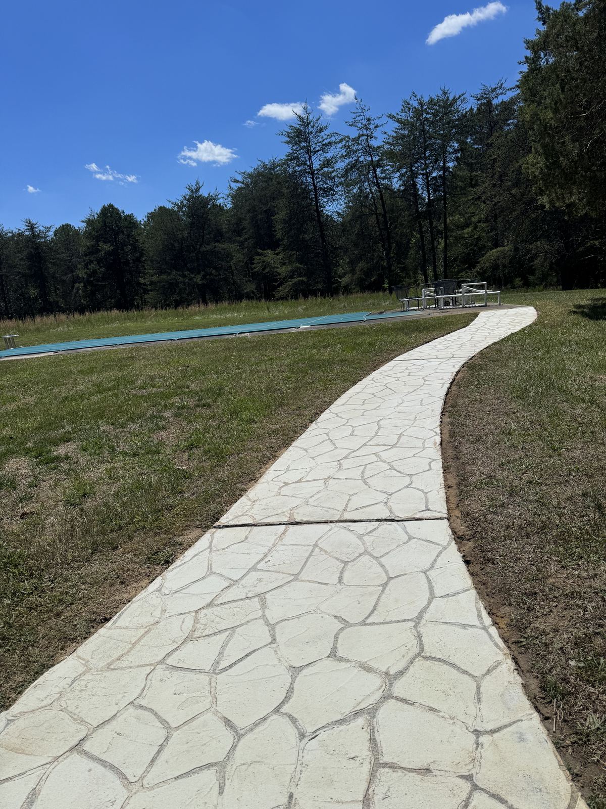 Clean stone walkway after pressure washing in Greensboro NC